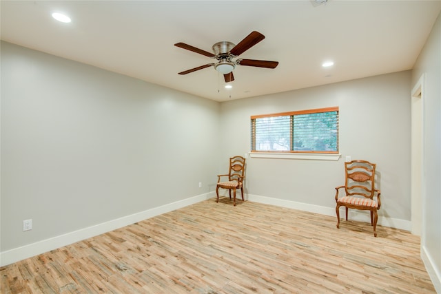 unfurnished room with light hardwood / wood-style flooring and ceiling fan