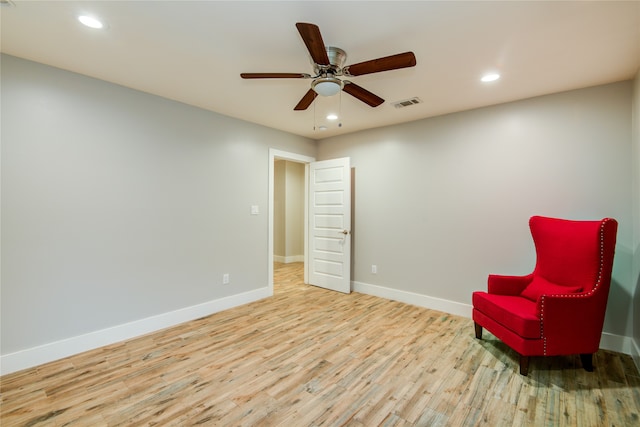 unfurnished room featuring ceiling fan and light wood-type flooring