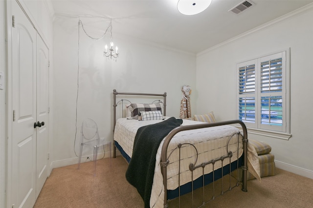 bedroom with crown molding, carpet flooring, and a chandelier