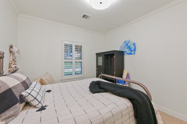 carpeted bedroom featuring ornamental molding