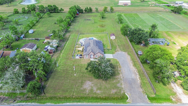 birds eye view of property featuring a rural view