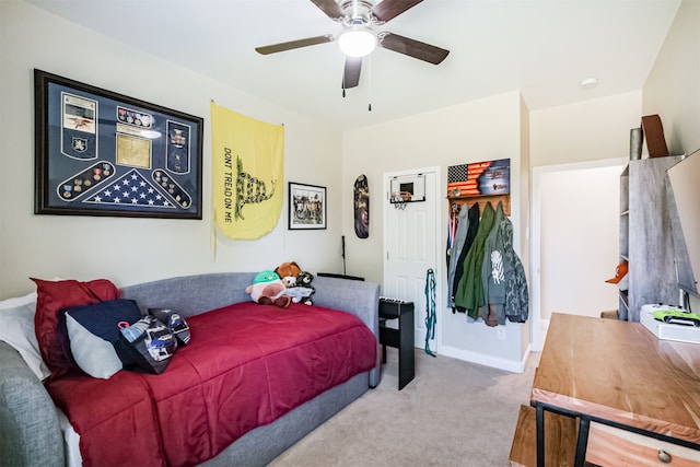 carpeted bedroom featuring ceiling fan