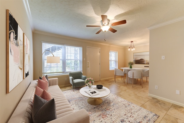 living room featuring ceiling fan, light tile patterned floors, crown molding, and a textured ceiling