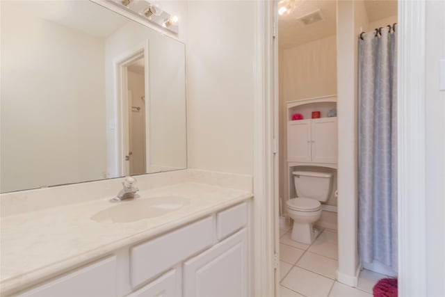 full bath featuring vanity, tile patterned flooring, toilet, and visible vents