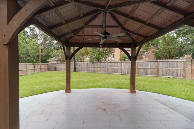 view of patio featuring a gazebo, a ceiling fan, and a fenced backyard