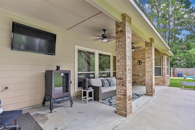 view of patio / terrace with ceiling fan and an outdoor hangout area