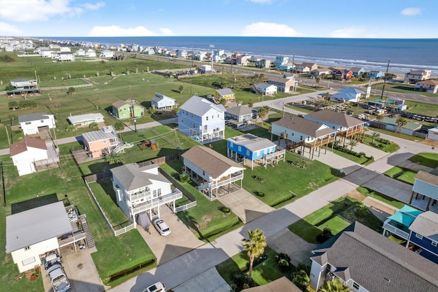 birds eye view of property featuring a water view and a residential view