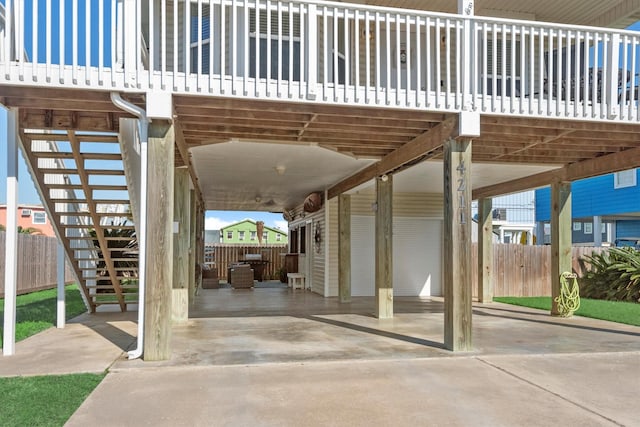 view of patio / terrace featuring fence