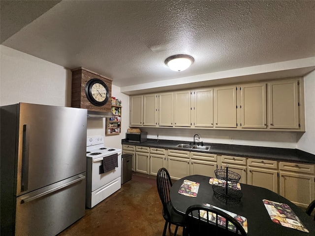 kitchen with sink, stainless steel appliances, cream cabinets, and exhaust hood