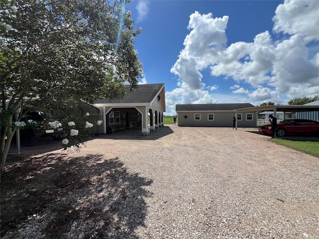 view of front of house with a carport