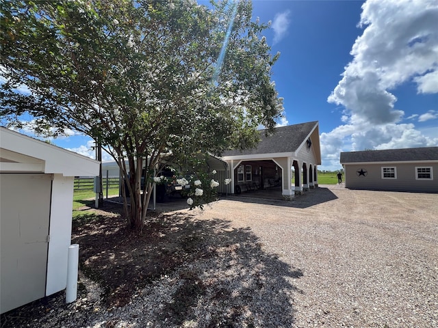 exterior space with an outbuilding