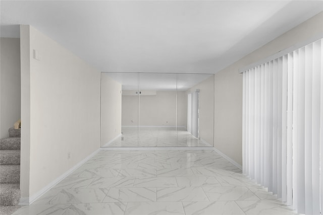 empty room featuring light tile patterned floors