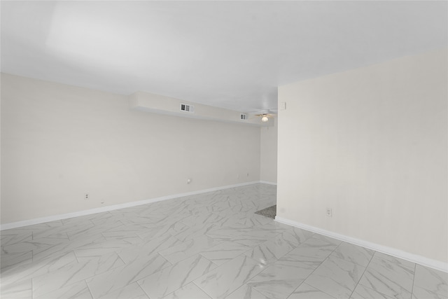 empty room with light tile patterned floors