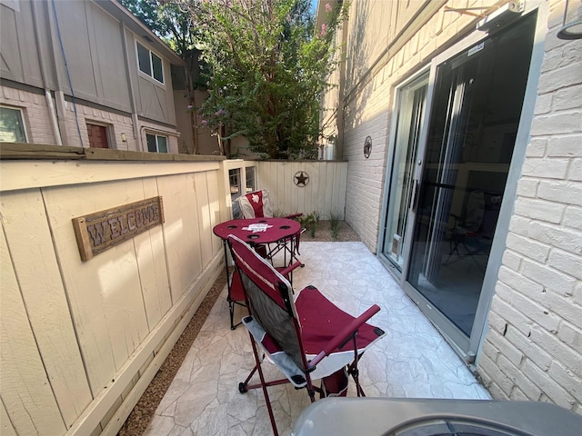 view of patio with fence