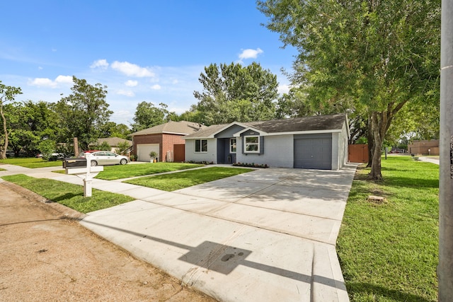 single story home with a garage and a front yard