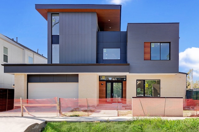 contemporary house featuring a garage