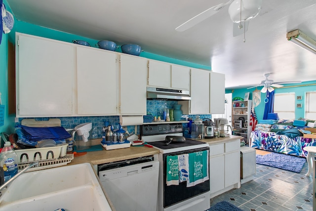 kitchen with white cabinetry, tile patterned floors, white appliances, tasteful backsplash, and ceiling fan