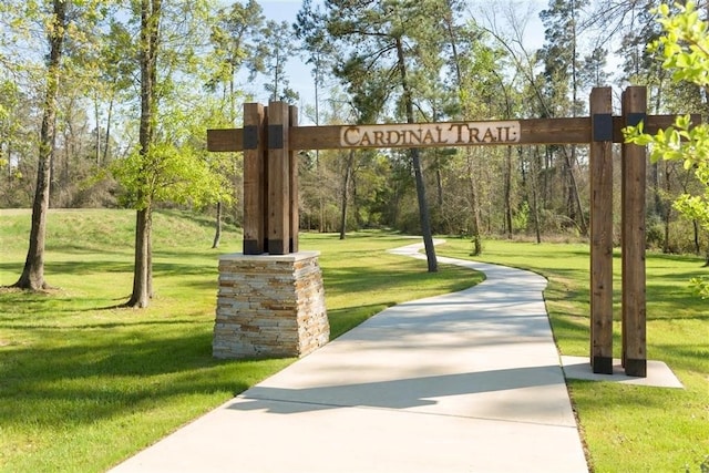 surrounding community featuring a lawn