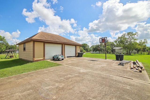 view of basketball court with a yard