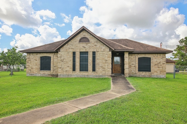 view of front of home with a front yard