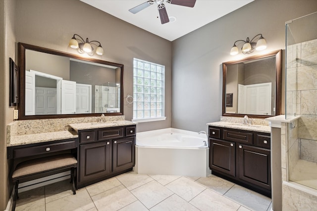 bathroom featuring tile patterned flooring, ceiling fan, plus walk in shower, and dual bowl vanity