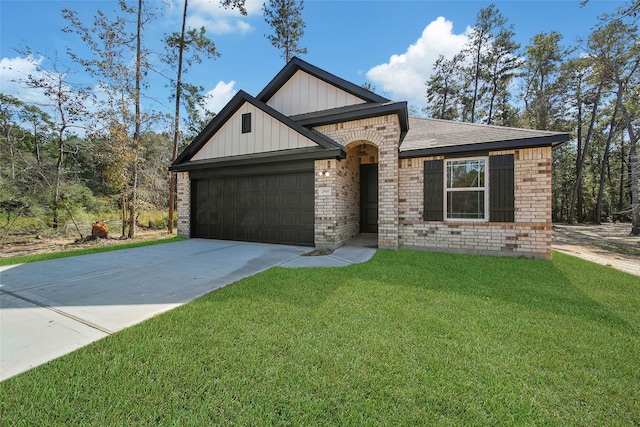 view of front of home featuring a front lawn and a garage