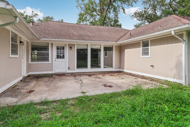 back of house featuring a patio area