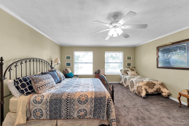 carpeted bedroom with ornamental molding, ceiling fan, and a textured ceiling