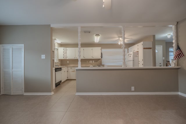 kitchen with sink, ceiling fan, white refrigerator, white cabinets, and stainless steel dishwasher