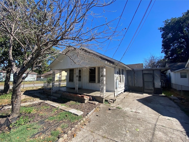 view of front of house featuring a carport