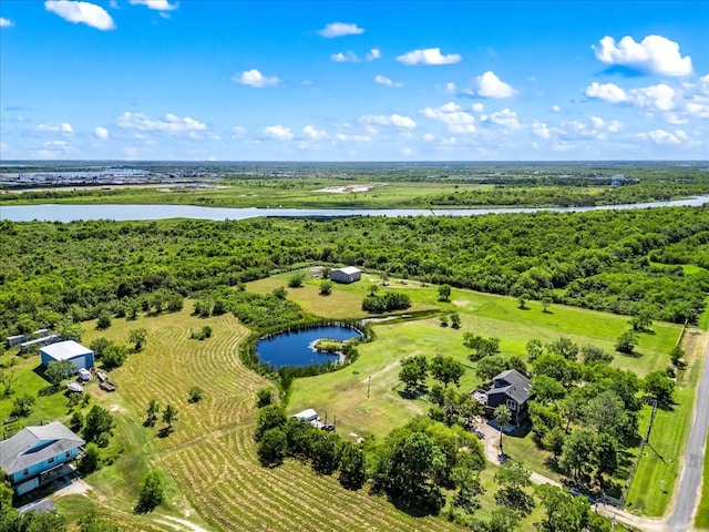 birds eye view of property with a water view and a rural view