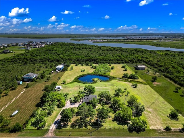 bird's eye view with a water view and a rural view