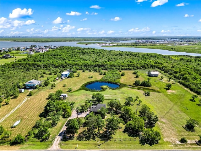 drone / aerial view featuring a water view and a rural view