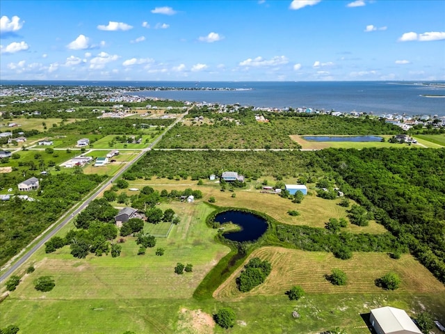 bird's eye view with a water view