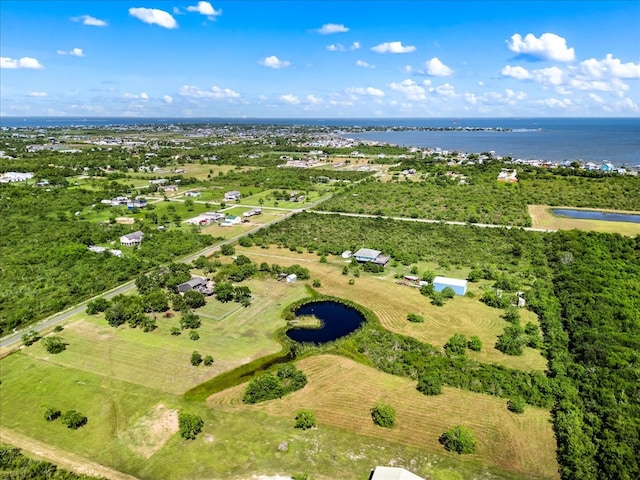 aerial view featuring a rural view and a water view