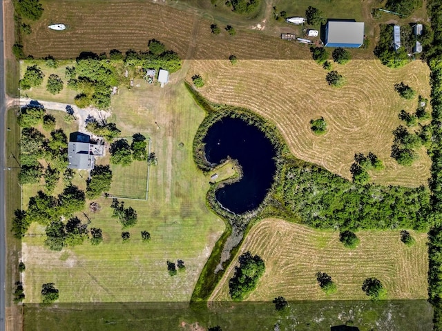 drone / aerial view with a rural view and a water view