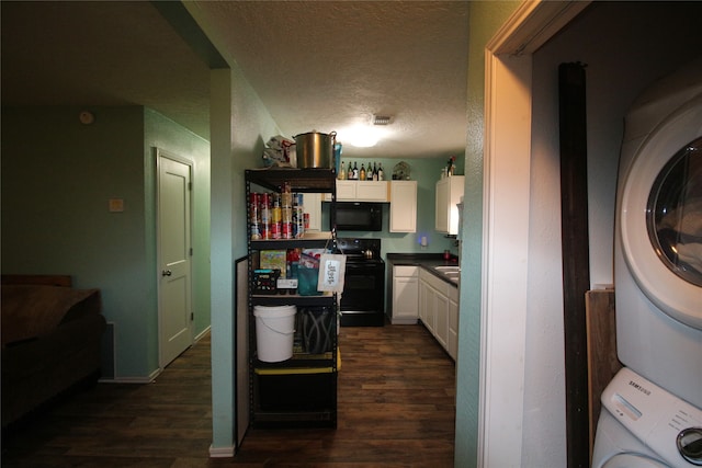 kitchen with stacked washing maching and dryer, dark hardwood / wood-style floors, a textured ceiling, electric stove, and white cabinets