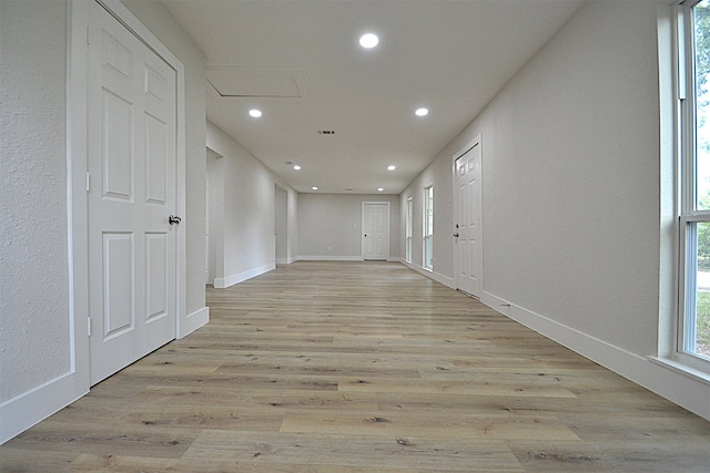 hallway featuring light wood-type flooring