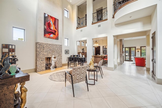 tiled living room featuring french doors