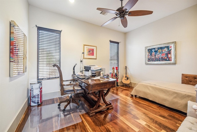 office featuring hardwood / wood-style floors and ceiling fan