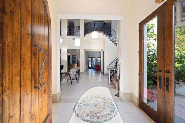 tiled entryway with french doors