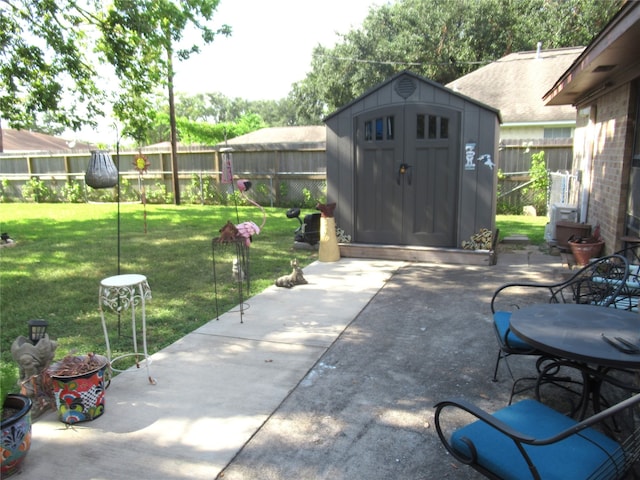 view of patio / terrace featuring a storage shed