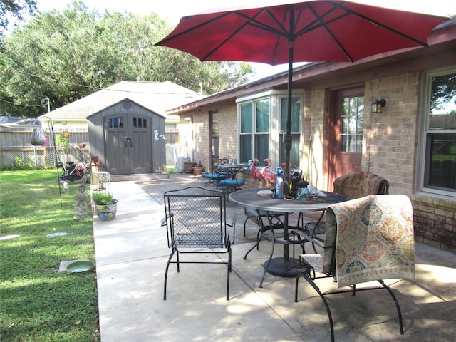 view of patio / terrace featuring a storage shed