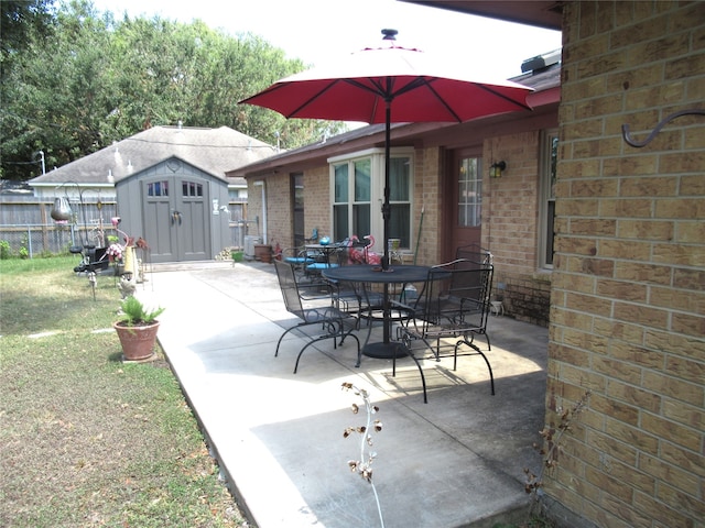 view of patio / terrace featuring a storage unit