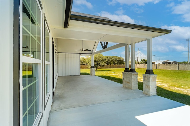 1714 Mackey Dr, Dickinson, TX 77539 - view of patio / terrace featuring ceiling fan and a carport