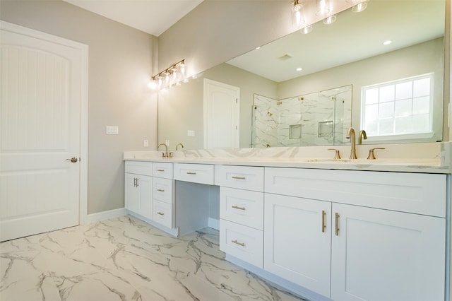 bathroom with vanity and an enclosed shower