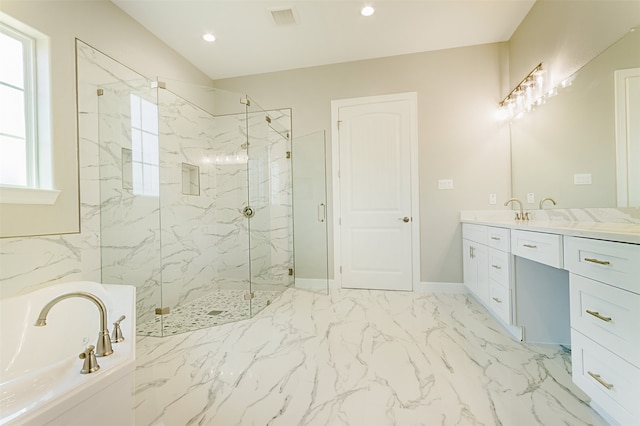 bathroom featuring vanity and plus walk in shower