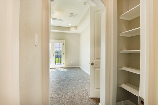 corridor featuring carpet