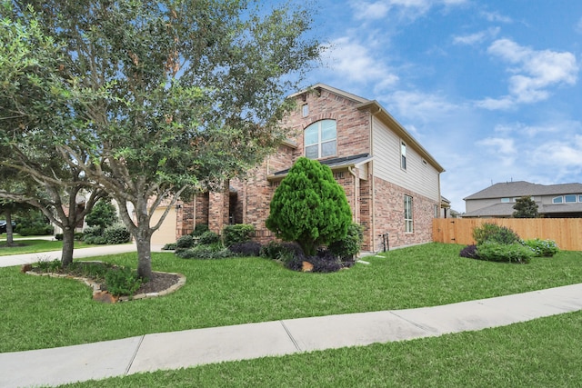 view of front of home with a front lawn