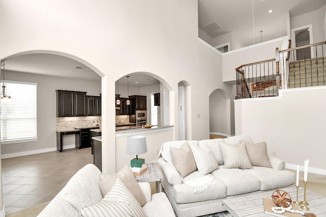 living room with light tile patterned floors